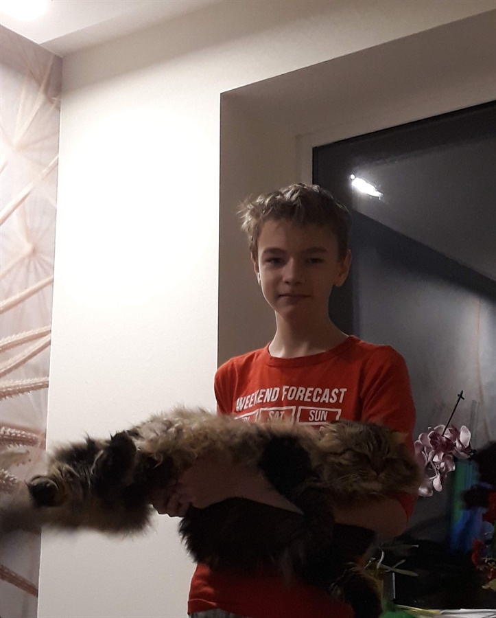 Максим із котом Мортом, який теж загинув під час евакуації