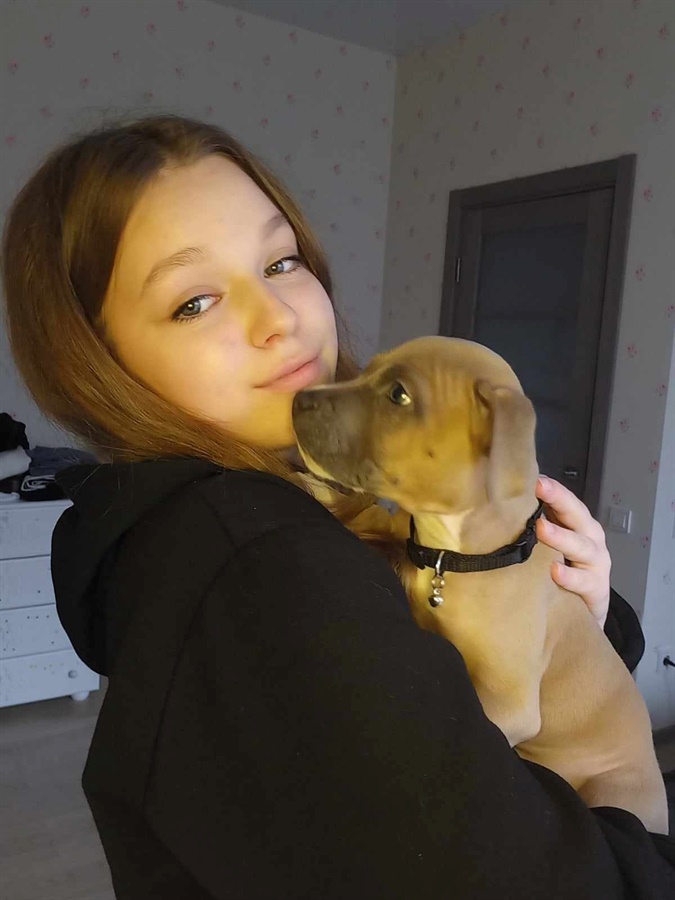Влада Веремеєнко з цуценям