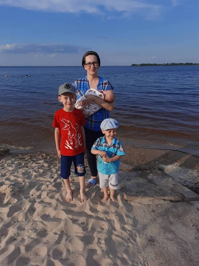 Ольга з трьома синами. Фото: з особистого архіву родини.